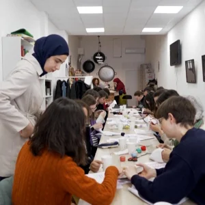 Threads of Resilience: Palestinian Refugee Preserves Heritage Through Embroidery in Madrid