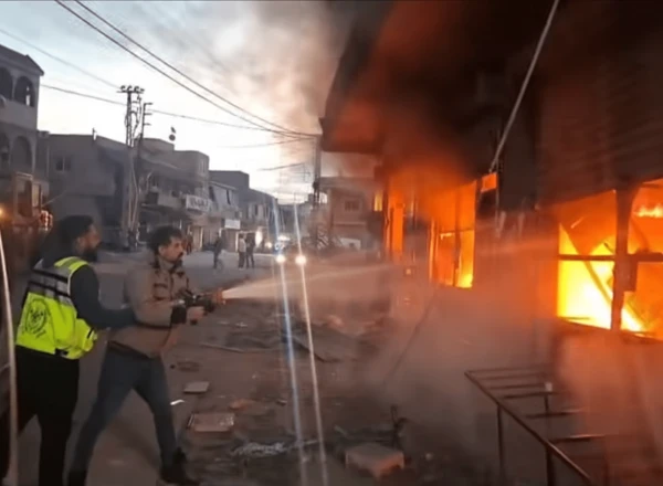 Lebanese Firefighters Battle Blaze After Israeli Strike in Southern Maarakeh