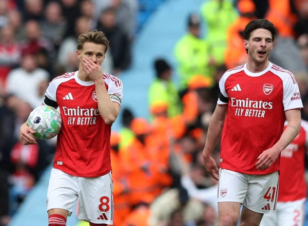 Arsenal's Title Hopes Fade After Crushing Defeat at Manchester City
