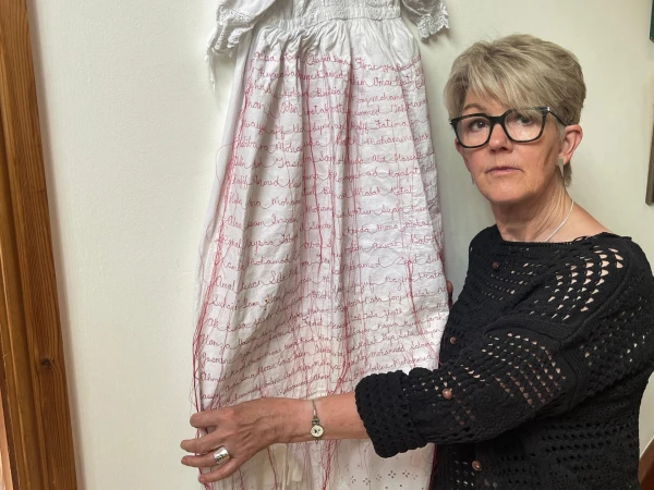 Welsh Artist Embroiders Names of Gaza's Slain Infants on Christening Gown in Poignant Protest