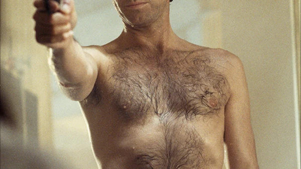 Can You ID This Shirtless Bond Hunk? Take a Guess!
