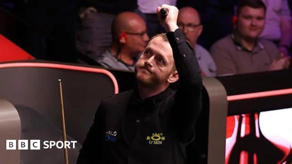 Allen Overcomes Stubborn Wilson to Clinch Quarter-Final Spot at Crucible