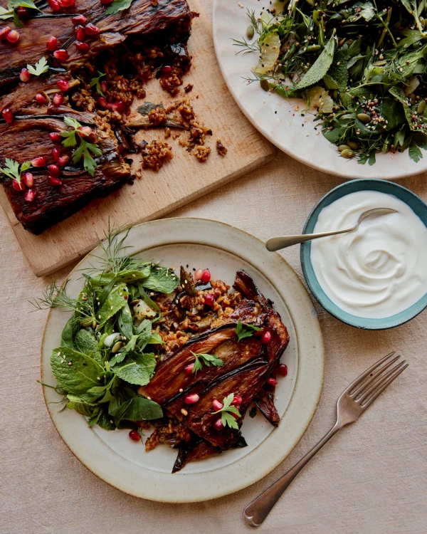 Sami Tamimi’s recipes for aubergine dolma bake with a spicy herb and spinach salad