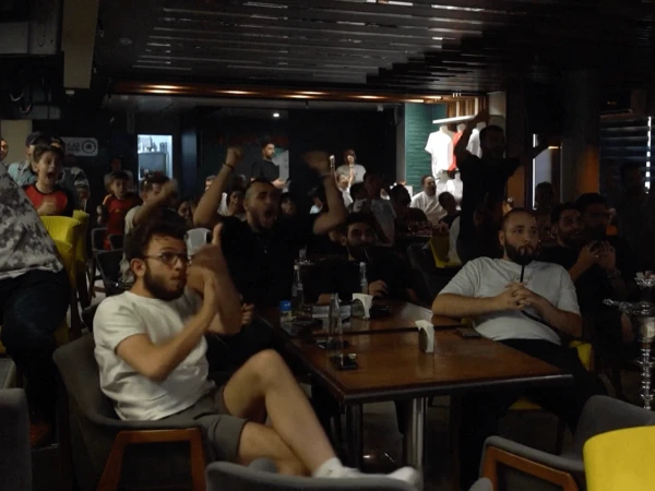 Iran fans react to team’s first World Cup match amid political schisms