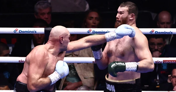 Fury Dominates Makhmudov in Return Bout, Sets Sights on Joshua Showdown