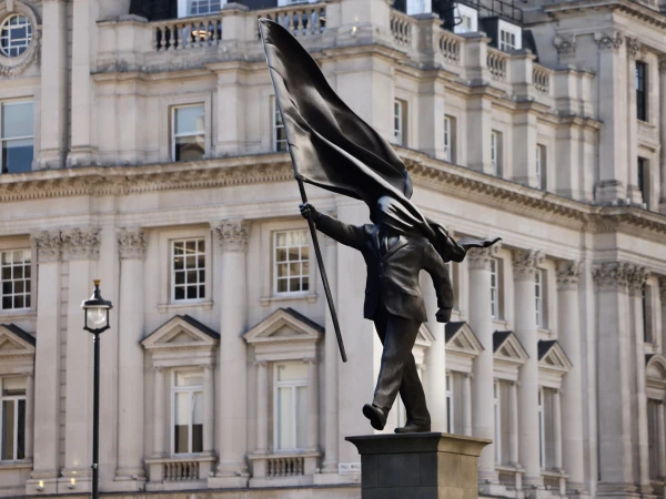 Banksy Unveils New Sculpture: Politician Blinded by His Own Flag