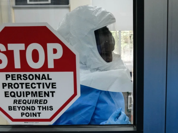 Global Travel Curbs Intensify as New Ebola Strain Emerges