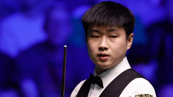 Zhao Xintong Dominates Judd Trump to Capture Tour Championship Crown