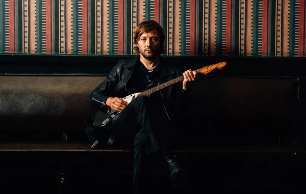 Tom Rowley on how a decade with Arctic Monkeys inspired his debut solo album ‘Moses & The Drones’