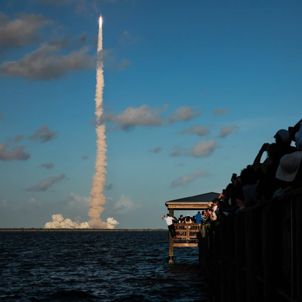 Space Exploration's Purpose Debated: Astronaut, Scientist and Journalist Clash on Human Missions