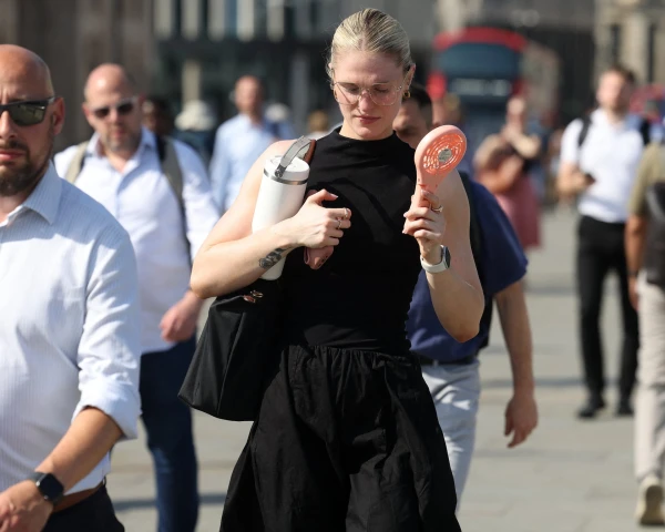 Beat the Office Heatwave: Dressing Smart Without Looking Like You're Headed to the Beach