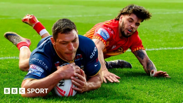 Leeds Rhinos Dominate Catalans with Eight-Try Masterclass to Retain Top Spot