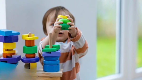 UK Secretary to Probe Hidden Fees in State-Funded Childcare