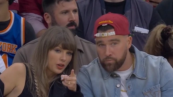 Taylor Swift Serves Travis Kelce Gum Courtside at Cavs Playoff Game