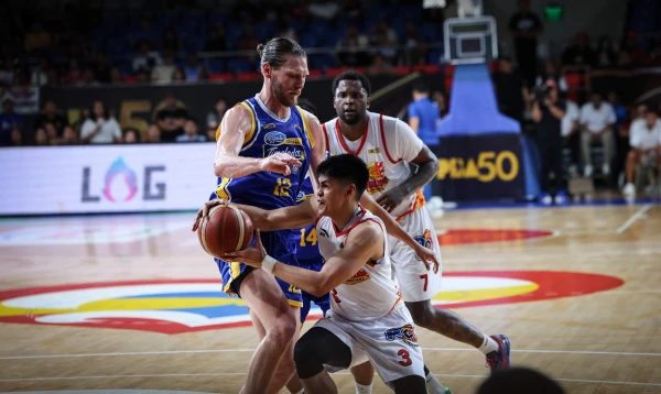 Mamuyac's Late Heroics Propel Rain or Shine Over Magnolia in Fierce Battle