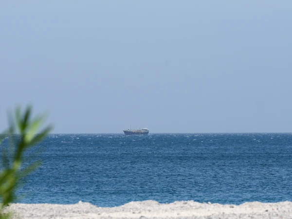 Tensions Rise as U.S. Warships Navigate Strait of Hormuz Amidst Mine-Clearing Operations