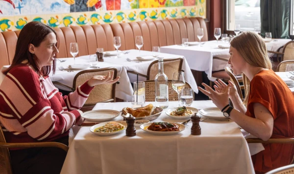 Billionaire Defender vs. Welfare Advocate: A Dinner Debate on Wealth and Taxation