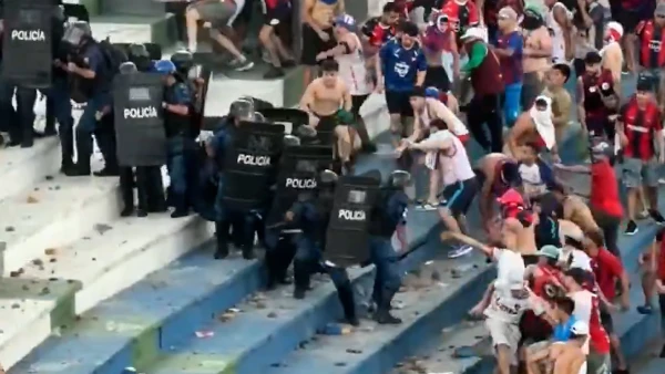 Chaos Erupts as Football Fans Clash with Police in Paraguay Stadium
