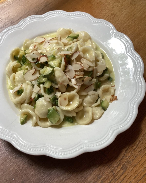 Rachel Roddy’s recipe for orecchiette with courgettes, parmesan cream and almonds | A kitchen in Rome