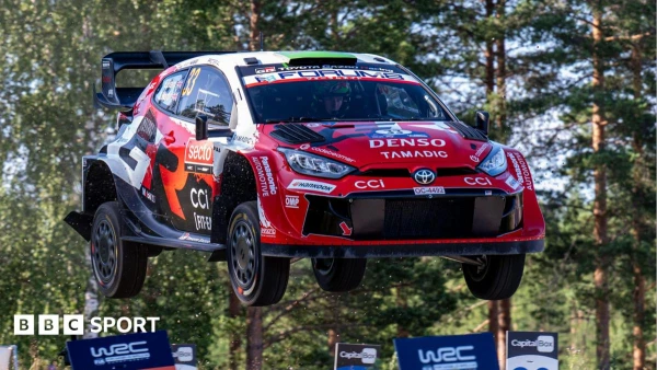 Evans Rallies to Third Place After Dramatic Roll, Ogier Hospitalized