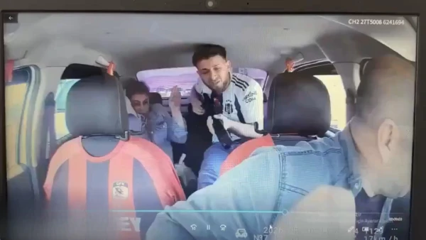 Moment taxi driver wrestles armed man during police chase in Turkiye