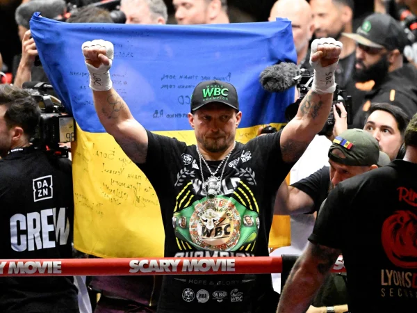 Usyk Survives Scare, Stops Verhoeven in 11th Round