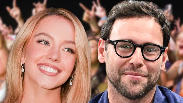 Scooter Braun Lifts Sydney Sweeney Onto His Shoulders at Stagecoach