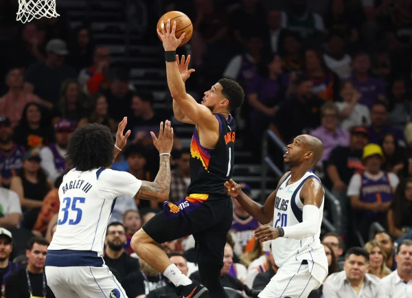 Phoenix Suns Clinch Playoff Spot with Dominant Victory Over Mavericks